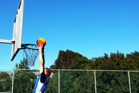 Two handed basketball dunkのeditorial素材