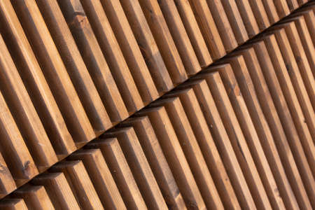 Background of wooden boards diagonally with a cutoutの写真素材