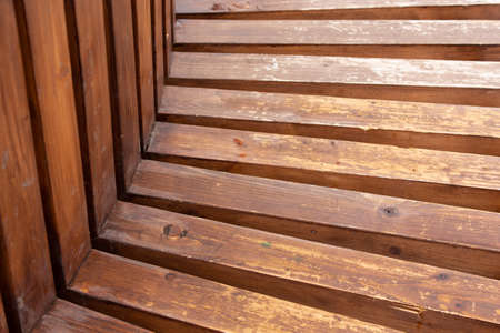 Decorative background of wooden boards, wooden bench close-upの写真素材