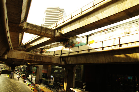 Skytrain at Siam Square in Bangkok, Thailand, late afternoon  Bridges cross over road のeditorial素材