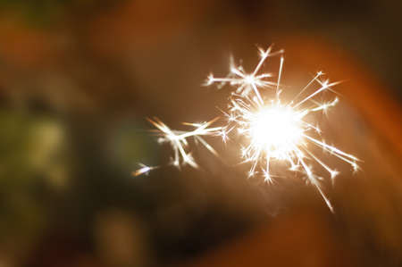 A spray candle on the Christmas treeの写真素材