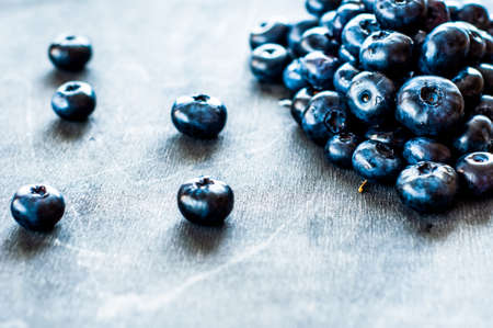 blueberries on a wooden backgroundの写真素材