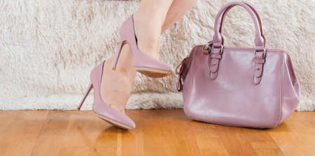 Pair of beige women's high-heeled shoes Feet bag powder colorの写真素材