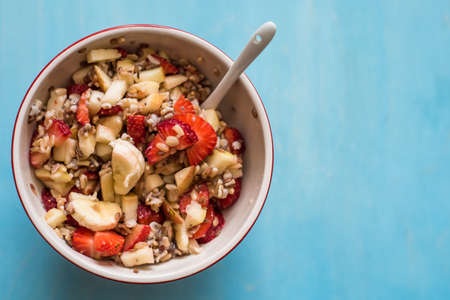 Fresh cottage cheese, sour cream, strawberry, banan and pear afor healthy eatingの写真素材