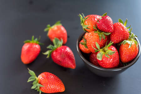 Ripe red strawberries in bowl . Fresh juice strawberry, healthy foodの写真素材