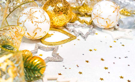 abstract christmas decor in gold and white caves with christmas toysの写真素材