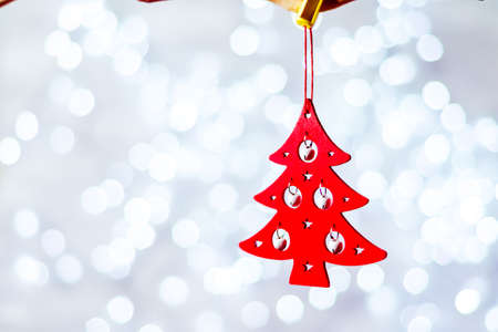 Christmas decoration hanging over wooden blue backgroundの写真素材