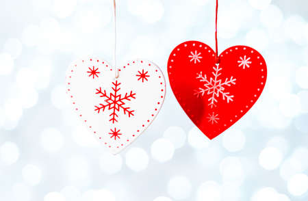 wooden heart sign with rope isolated on white backgroundの写真素材