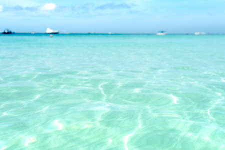 Tropical transparent sea water texture reflections on a tropical beach of the Philippines Boracay