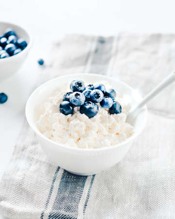 Fresh cottage cheese with blueberriesの写真素材
