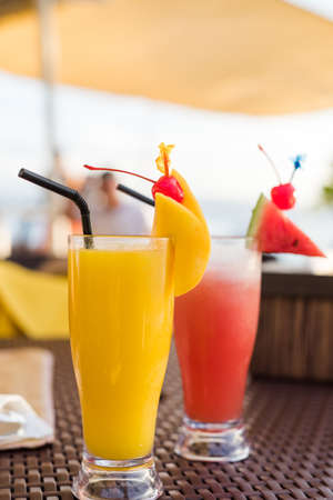 Home made watermelon and pineapple smoothie decorated with slices of watermelon, pineapple