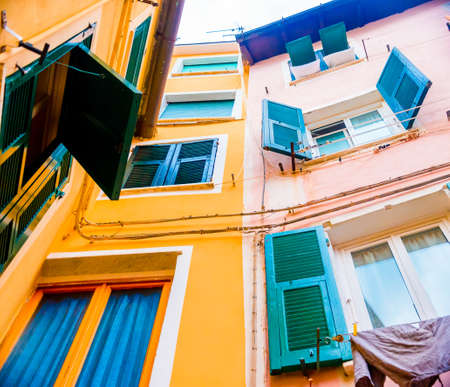 Colorful buildings in Monterosso in Cinque Terre, Italy on sunny day.の写真素材