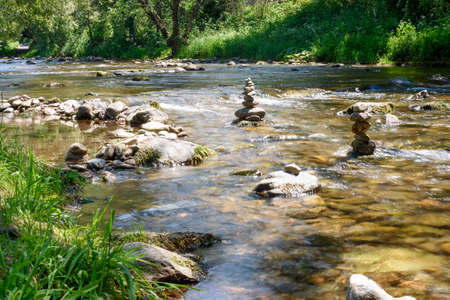 Dreisam in Freiburg in spring, River in the city of Freiburg, Germany, stonesの写真素材