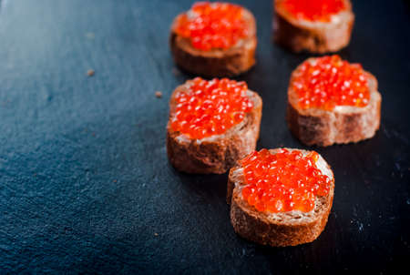 Red caviar on slateの写真素材
