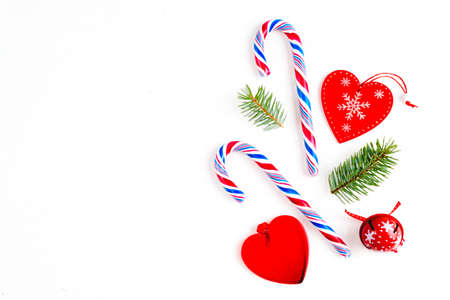 Christmas composition. Christmas gifts, pine branches, toys on white