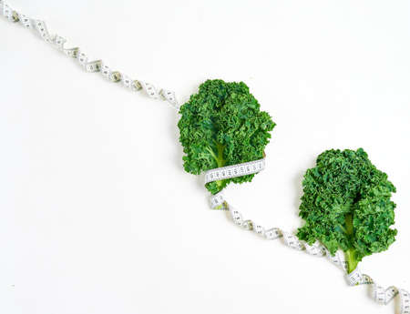 Kale with measuring tape