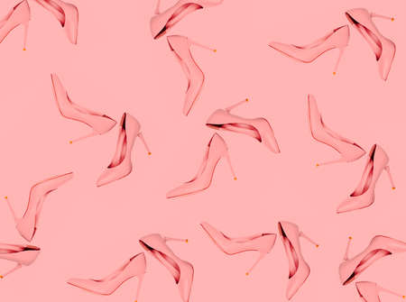 Pale pink female shoes on white background. Flat lay, top view trendy fashion feminine background.の写真素材