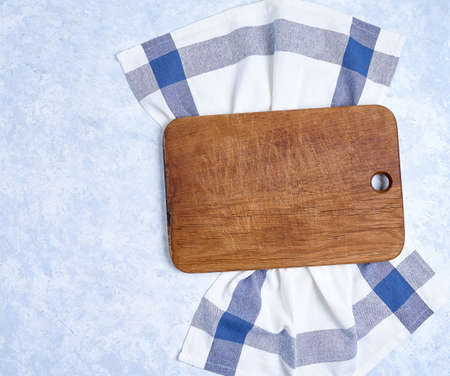 kitchen cloth napkin and kitchen board on white background with copy space