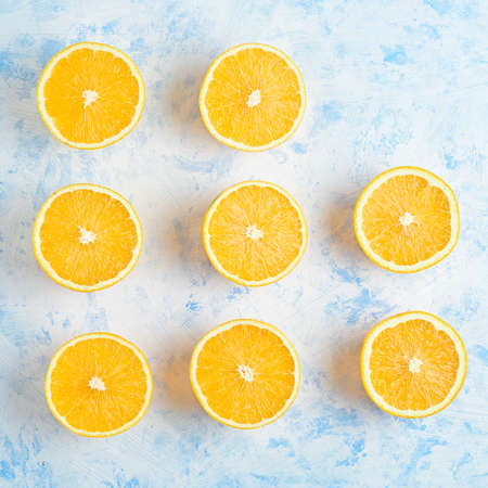 halves of oranges sliced for making orange juice
