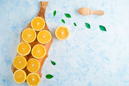 halves of oranges sliced for making orange juice