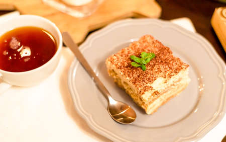 tiramisu divine dessert perfect for a candlelight date. Italian sweet dessert concept.の写真素材