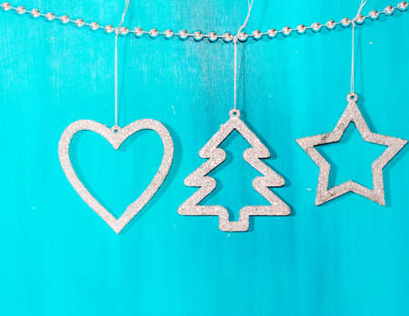 Christmas card with stars,fir and fir-cone on wooden