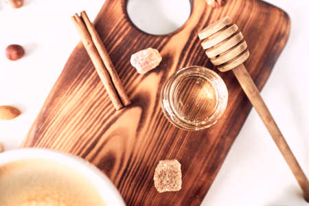 breakfast pattern, coffee, honey, cinnamon sticks, nuts, sugar. Good morning concept.の写真素材
