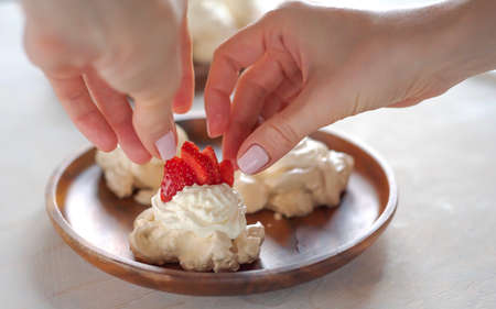 Strawberry pavlova cake, pavlova dessert, the meringue with strawberriesの写真素材