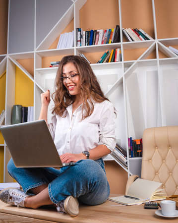 business woman happy to end quarantine and return to officeの写真素材