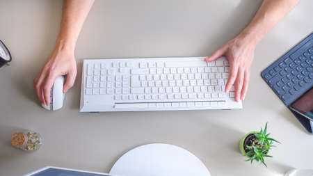 Image of man's hands typing. Selective focusの写真素材