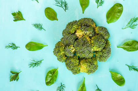 green broccoli on wood tableの写真素材