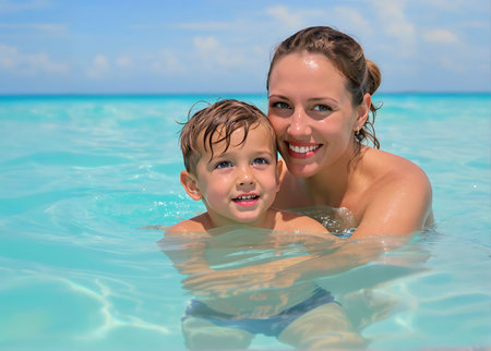 Mother and son in swimming pool. Summer vacation at Maldives.の素材