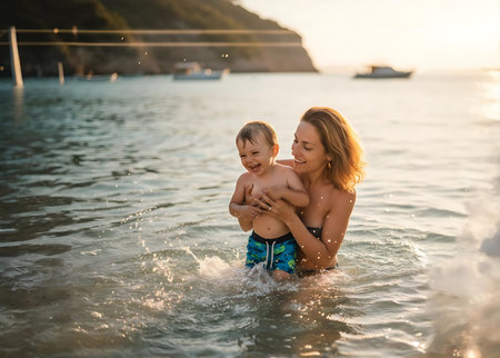 Mother and son having fun on the beach at sunset. Happy family.の素材