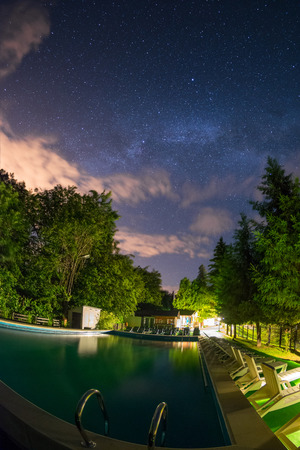 Milky way over the poolのeditorial素材