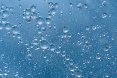 Colored air bubbles in waterの写真素材