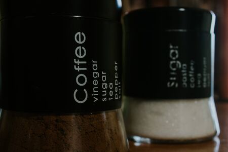 coffee and sugar jars on a table