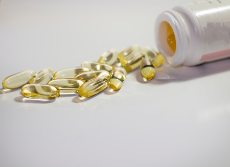 medication fish oil for heart health pills on a with background