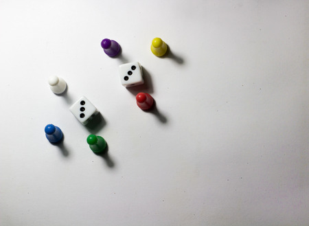 dices and pawns isolated on a white background 3s