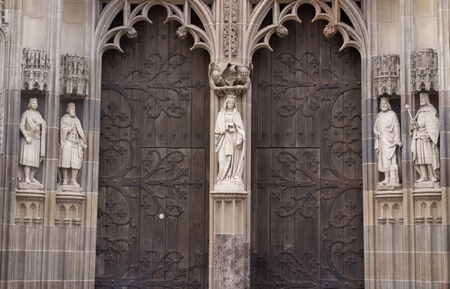 statues on the entrance of a cathedral catholic in kosice slovakiaの写真素材