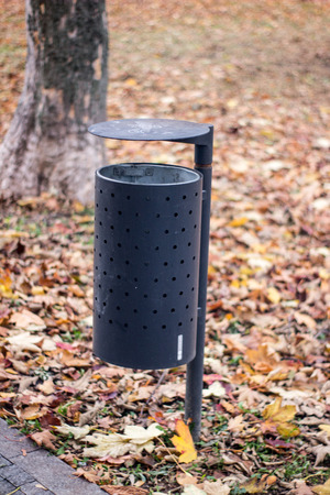 trash can on a park autumn scenery bin recycle scenicの写真素材