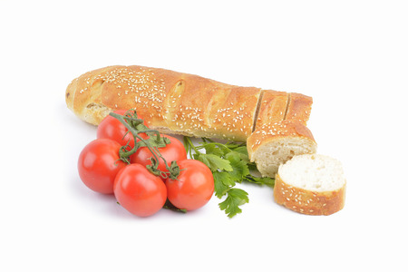 fresh homemade natural bread with vegetables  on white backgroundの写真素材