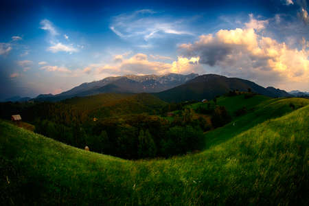 Evening, sunset on mountain hills of Simon village. Bran.の写真素材
