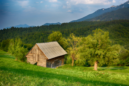 Evening, sunset on mountain hills of Simon village. Bran.の写真素材