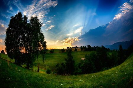Evening, sunset on mountain hills of Simon village. Bran.の写真素材