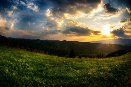 Evening, sunset on mountain hills of Simon village. Bran.の写真素材