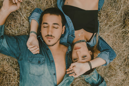 lovely couple photo shooting on a country sideの写真素材