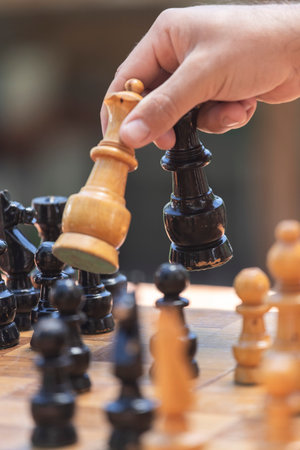 Man holding a chess pieceの写真素材