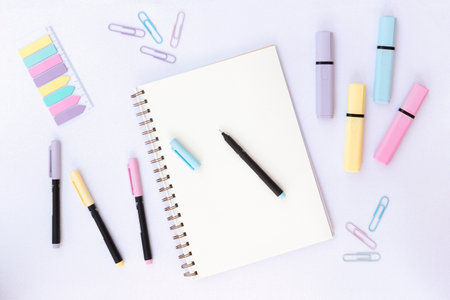 School and office Supplies on a glitter background