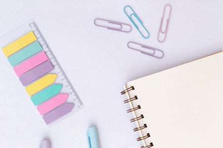School and office Supplies on a glitter background