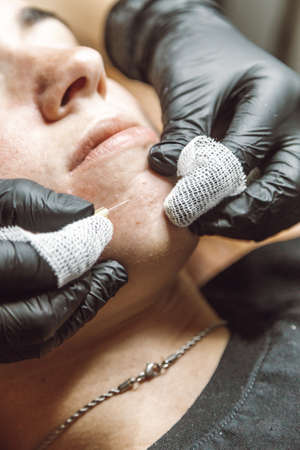 woman receiving a facial in a beauty salon
